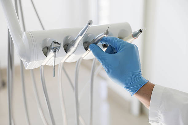 Professional Emergency Dentist technician working in North Palm Beach, FL